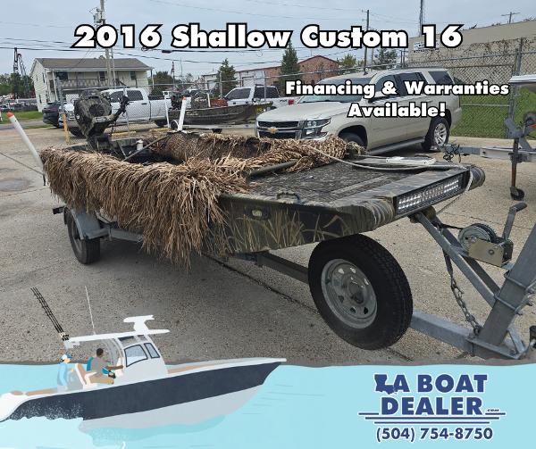 Custom Shallow 16 2016 Shallow Custom 16 boat with camouflage design, available at LA Boat Dealer.