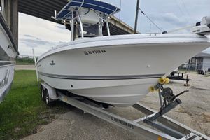 Wellcraft Tournament Edition 2004 Wellcraft Tournament Edition boat on trailer, parked outdoors under a bridge.