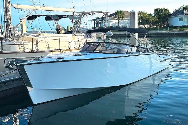 VanDutch Sport 35 2023 VanDutch Sport 35 yacht docked in a marina, reflecting on calm water.