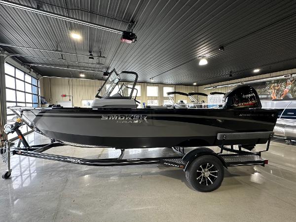 Smoker Craft Adventurer 188 DC 2025 Smoker Craft Adventurer 188 DC boat in showroom, side view.