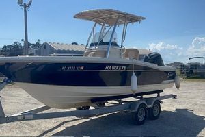 Scout 215 XSF 2022 Scout 215 XSF boat named "Hawkeye" on a trailer in a sunny outdoor setting.