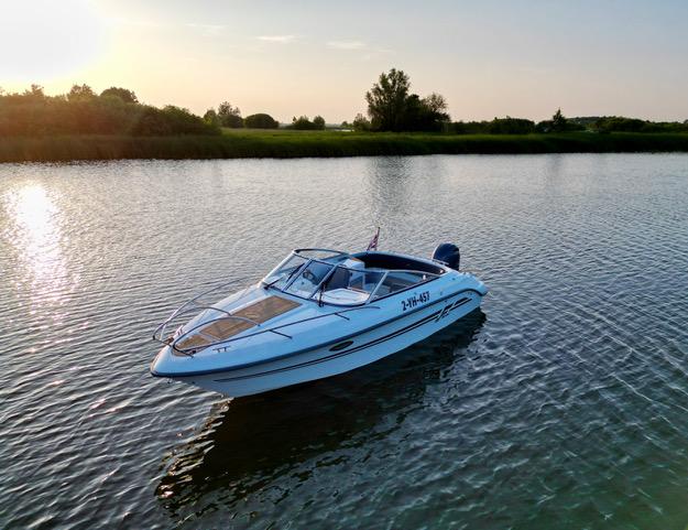 Finnmaster 68DC 2017 Finnmaster 68DC boat on calm water at sunset.
