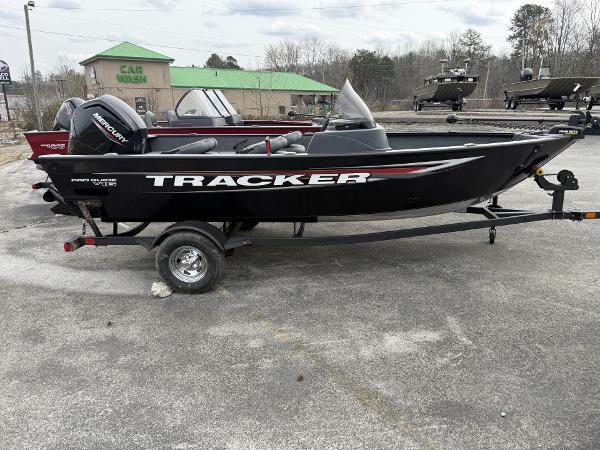 Tracker Pro Guide V-16 SC 2025 Tracker Pro Guide V-16 SC boat on trailer in outdoor setting.