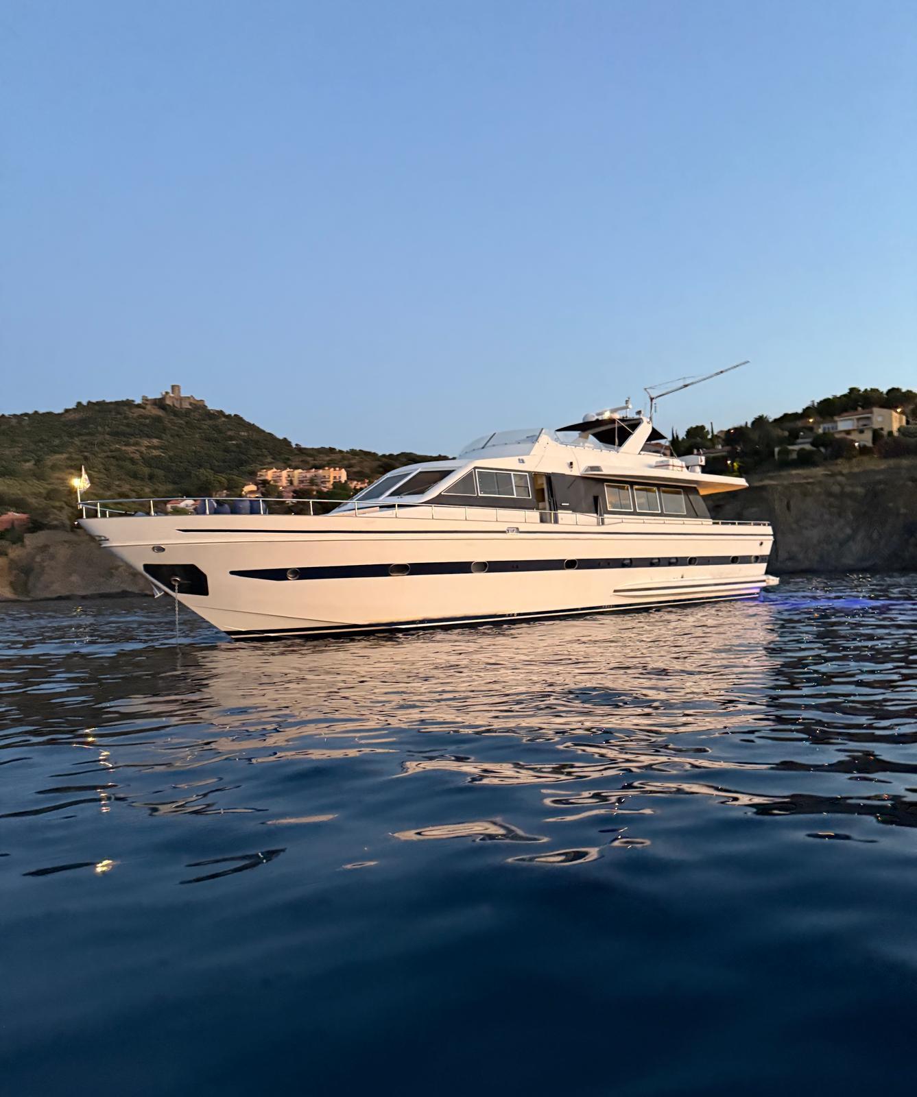 Falcon Yachts Falcon 80 1991 Falcon Yachts Falcon 80 cruising on serene waters at sunset.