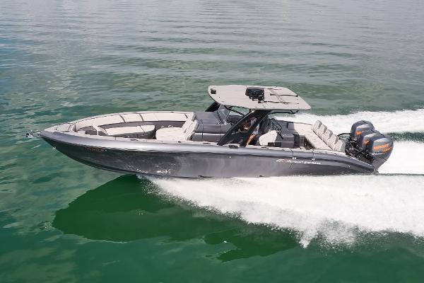 Midnight Express 37' Open 2023 Midnight Express 37' Open boat cruising on calm water.