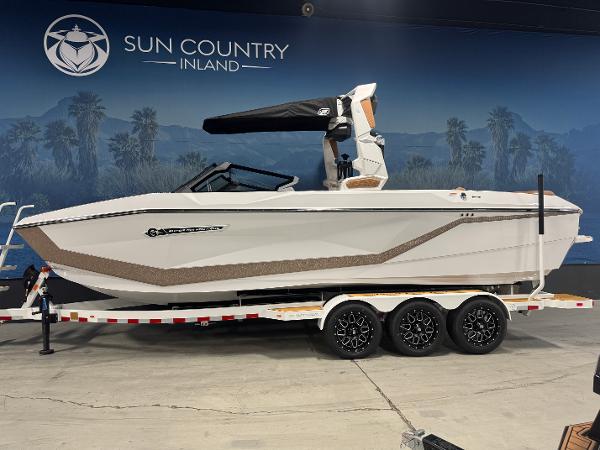 Nautique Super Air Nautique G25 2025 Nautique Super Air Nautique G25 boat on trailer at Sun Country Inland showroom.