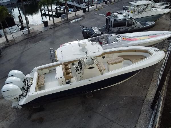Hydra-Sports Vector 3300 CC 2006 Hydra-Sports Vector 3300 CC boat docked with twin engines, aerial view.