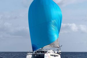 C-Catamarans C-CAT 38 2026 C-Catamarans C-CAT 38 sailing with a vibrant blue spinnaker on open sea.