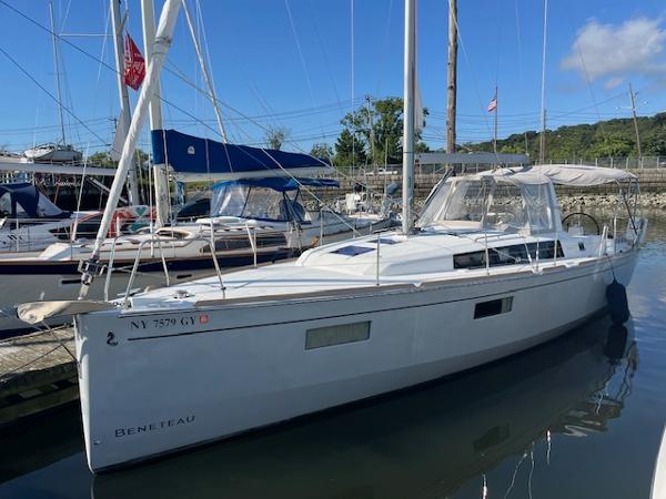 Beneteau Oceanis 38.1 2017 Beneteau Oceanis 38.1 sailboat docked in marina under clear blue sky.