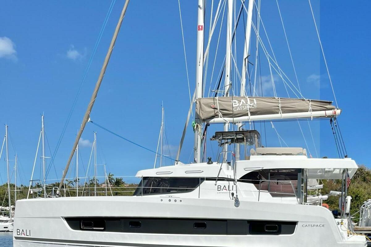 Bali CATSPACE 2022 Bali CATSPACE catamaran docked under clear blue sky.