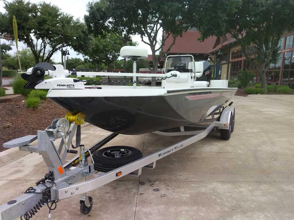 Ranger RB210 2025 Ranger RB210 boat on trailer, featuring Minn Kota Terrova motor, parked outdoors.