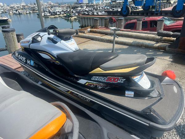 Kawasaki Ultra 300X 2013 Kawasaki Ultra 300X jet ski docked at a marina.