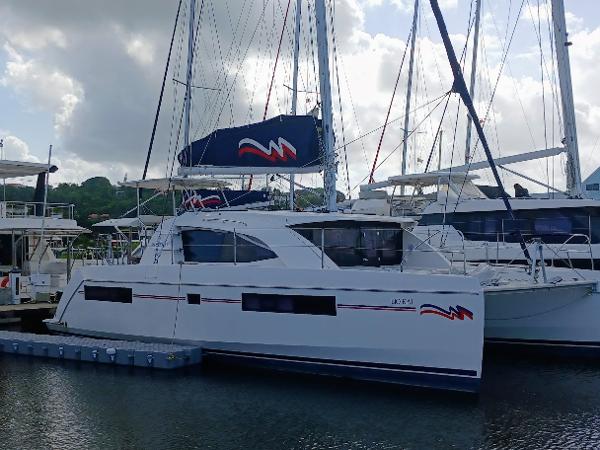 Leopard 40 2020 Leopard 40 catamaran docked at marina under cloudy sky.