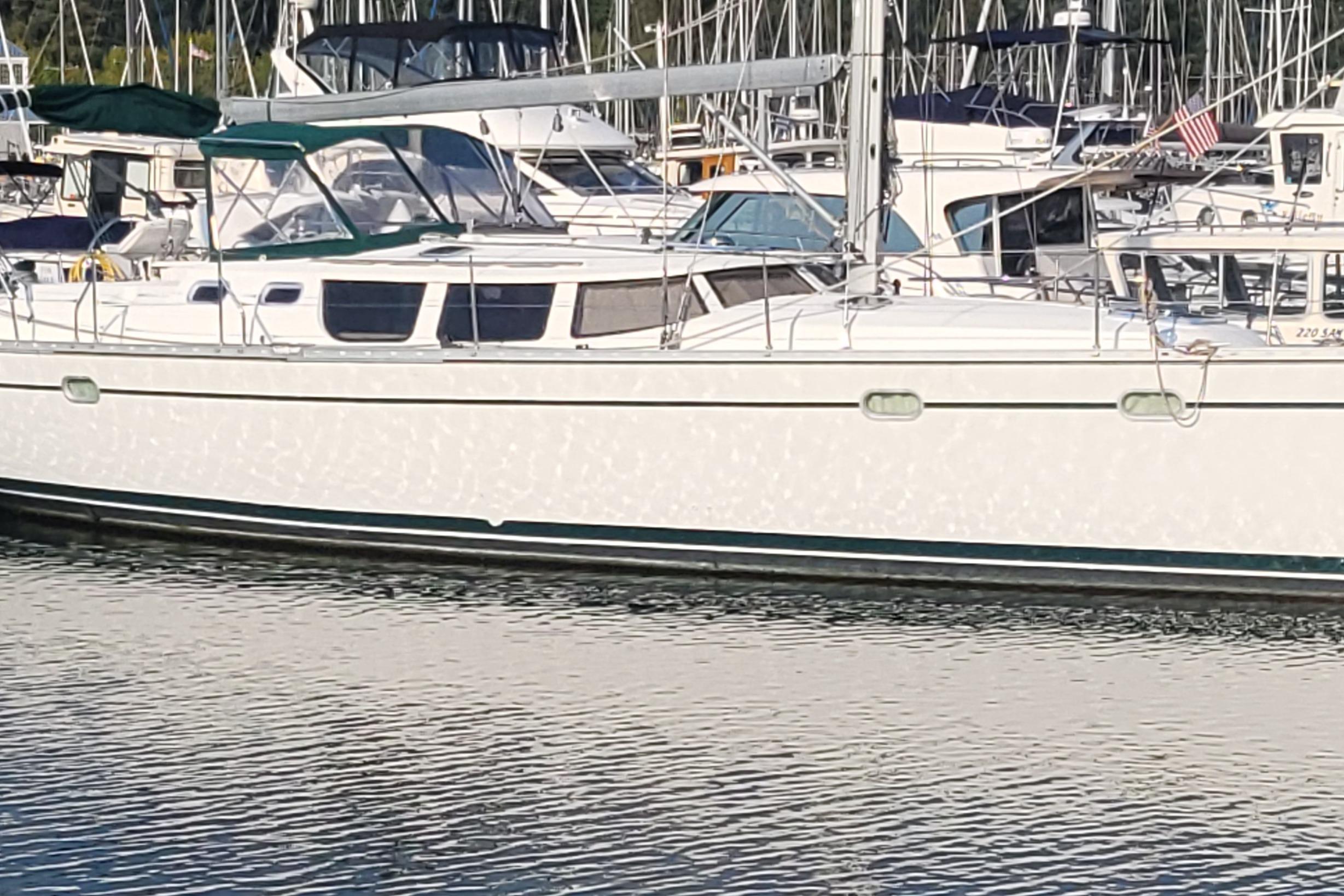 Jeanneau Sun Odyssey 43 DS 2002 Jeanneau Sun Odyssey 43 DS sailboat docked in marina.