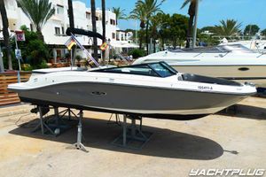 Sea Ray SPX 230 2018 Sea Ray SPX 230 boat displayed on stands in a marina setting.