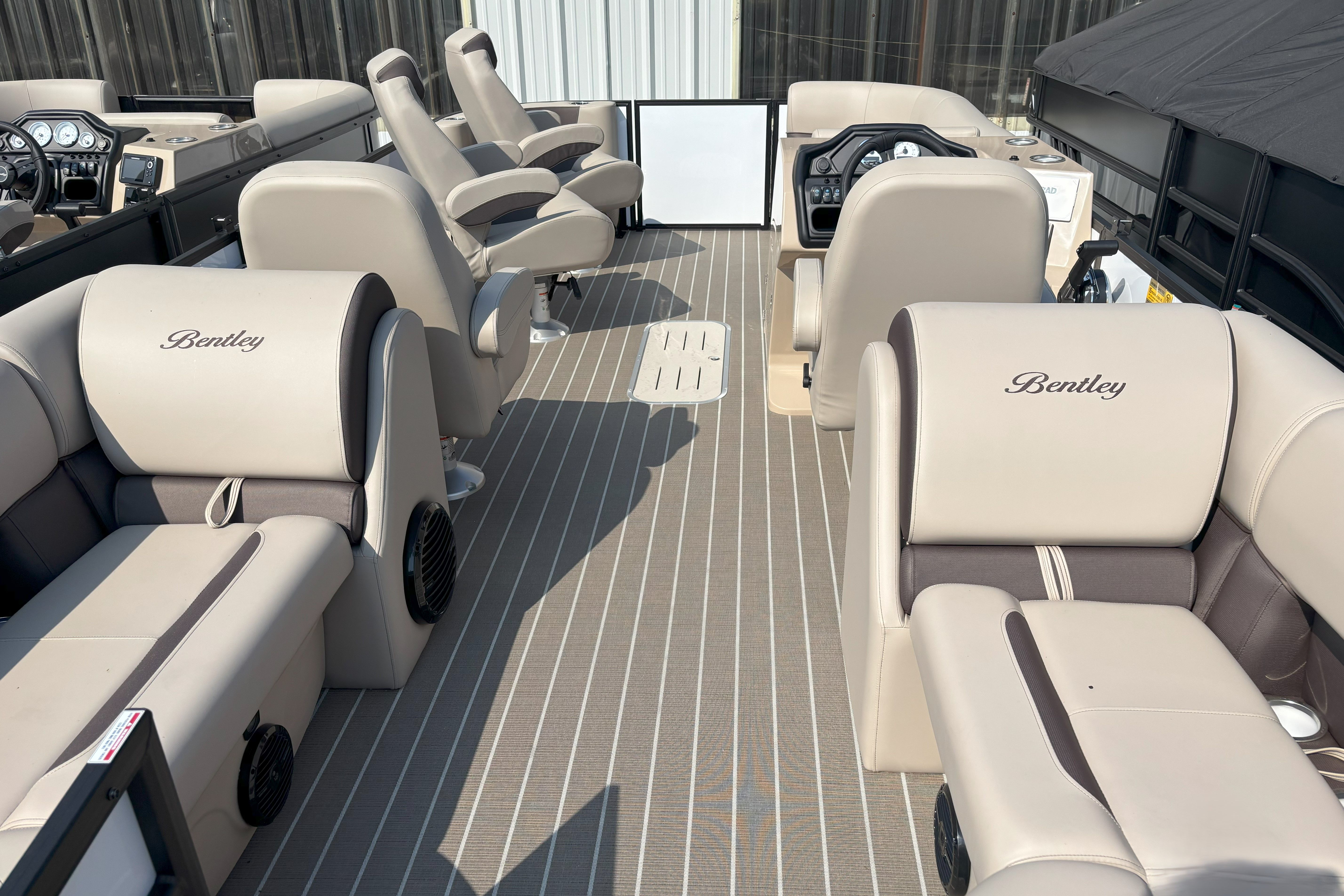 Bentley Pontoons Legacy 223 DL Navigator Interior of 2026 Bentley Pontoons Legacy 223 DL Navigator with luxurious seating and modern dashboard.