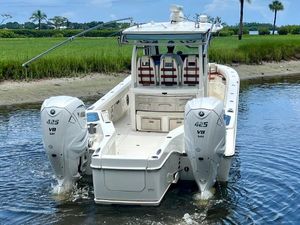 Solace 345 CC 2020 Solace 345 CC boat with twin 425 V8 engines in a scenic waterway.