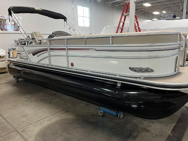Ranger Reata 223C 2023 Ranger Reata 223C pontoon boat in showroom.