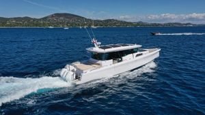 Axopar 45 XC Cross Cabin 2023 Axopar 45 XC Cross Cabin cruising on blue ocean waters.
