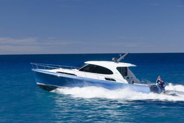 Palm Beach Motor Yachts GT50 2026 Palm Beach Motor Yachts GT50 cruising on open blue sea.