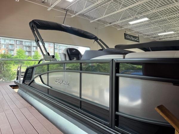 Barletta Lusso 23UC 2025 Barletta Lusso 23UC pontoon boat displayed indoors with sleek design and modern features.