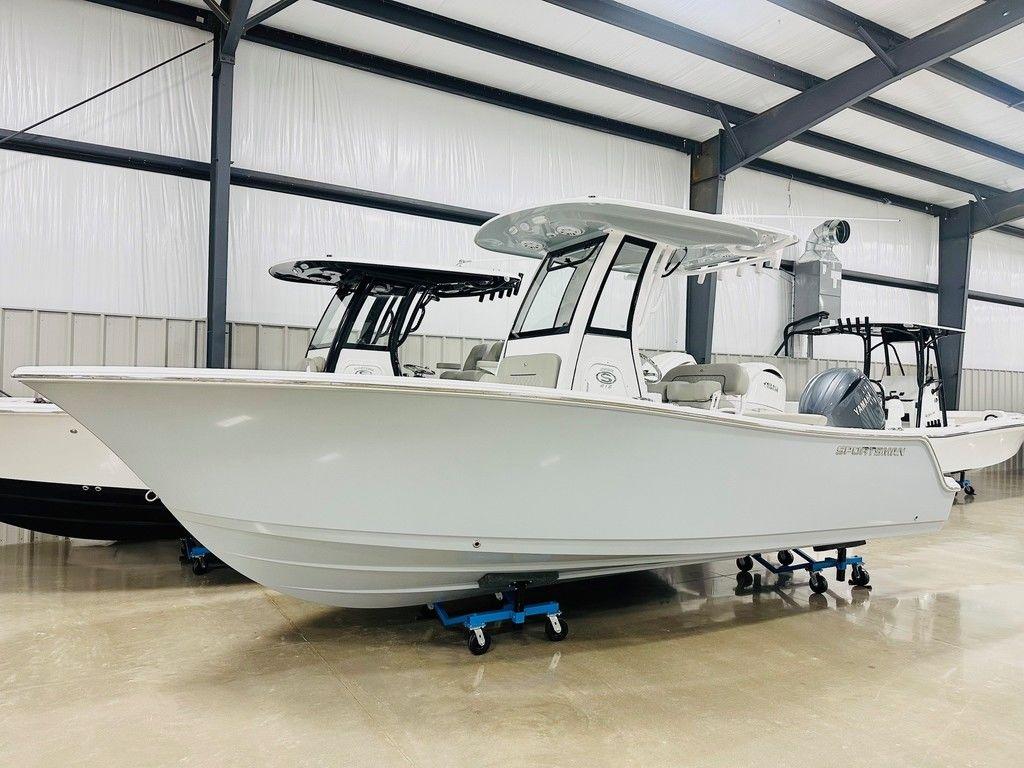 Sportsman Open 212 Center Console 2025 Sportsman Open 212 boat displayed indoors on a wheeled platform.