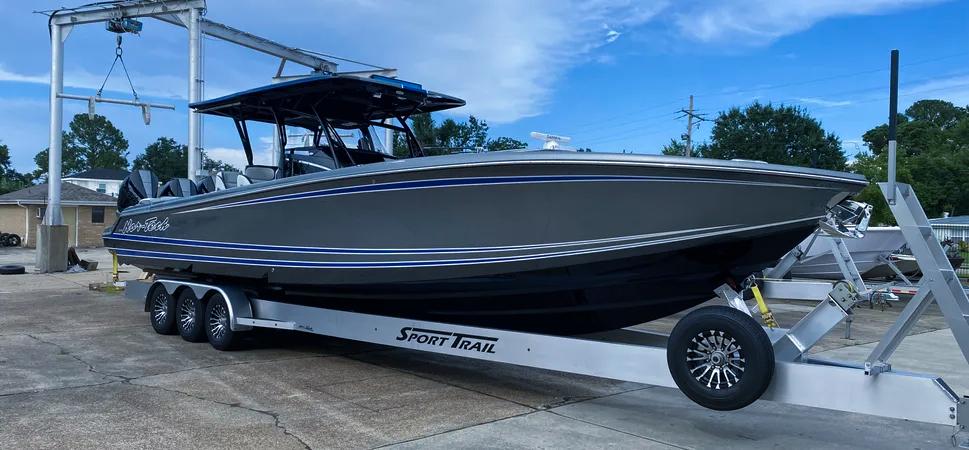 Nor-Tech 390 Sport Center Console 2023 Nor-Tech 390 Sport Center Console boat on trailer, parked outdoors.