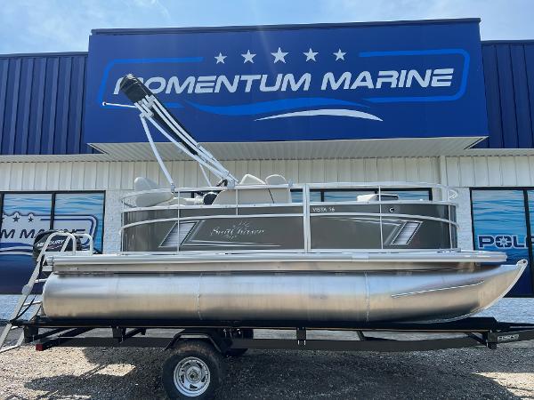 SunChaser Vista 16 Fish 2023 SunChaser Vista 16 Fish pontoon boat on trailer at Momentum Marine dealership.