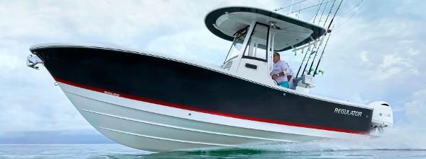 Regulator Regulator 23 2026 Regulator 23 boat cruising on water, featuring sleek design and modern features.