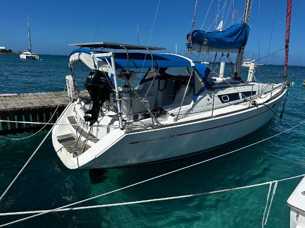 Jeanneau Sun Odyssey 36i 2009 Jeanneau Sun Odyssey 36i sailboat docked in clear blue water.