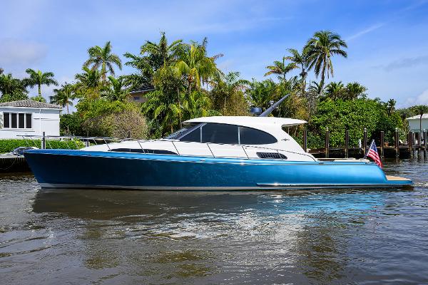 Palm Beach Motor Yachts GT50 2019 Palm Beach Motor Yachts GT50 cruising on a tropical waterway.