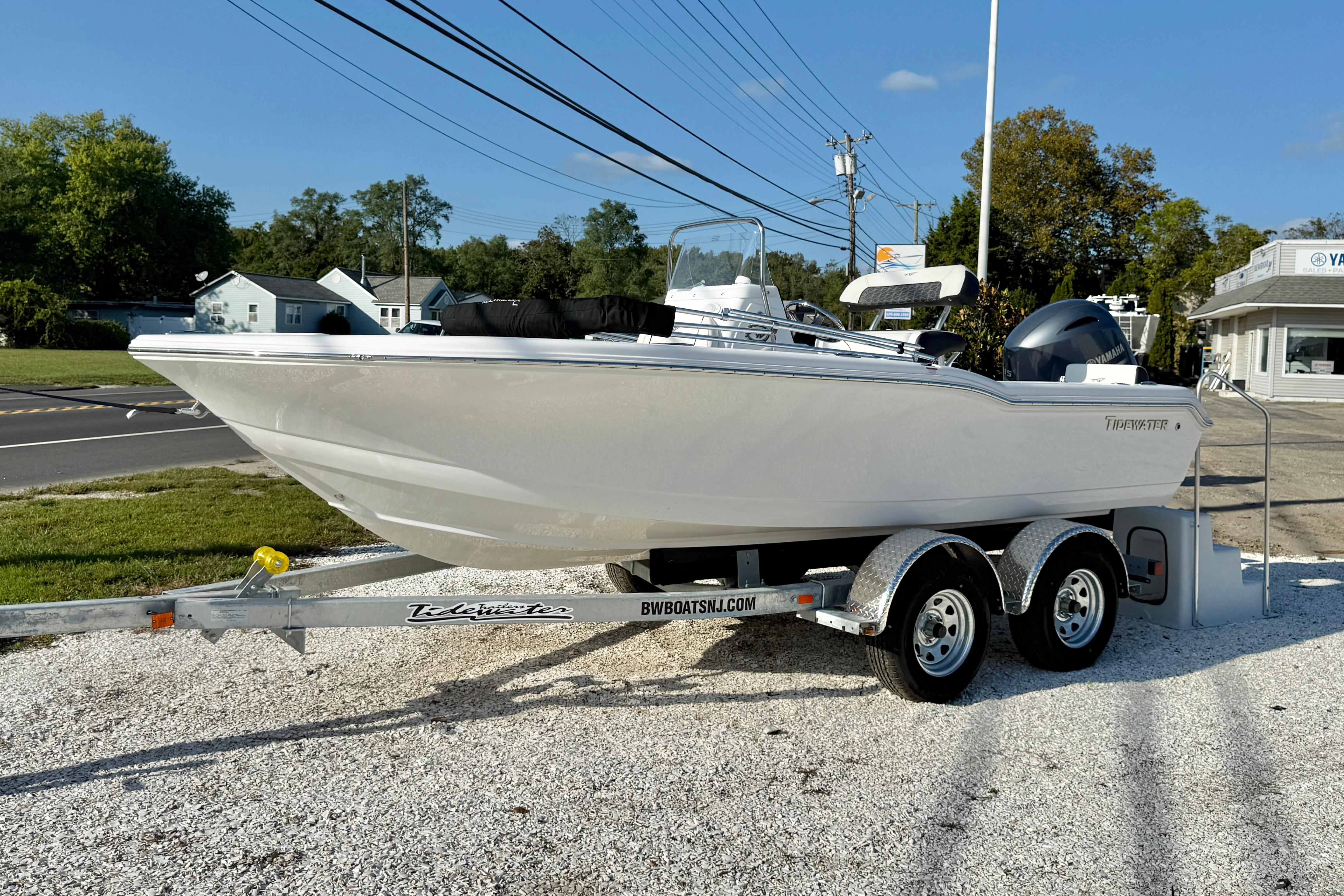 Tidewater 180 CC Adventure 2026 Tidewater 180 CC Adventure boat on trailer, parked outdoors on gravel.