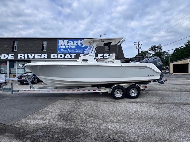 Edgewater 262CC 2017 Edgewater 262CC boat on trailer at riverside dealership.