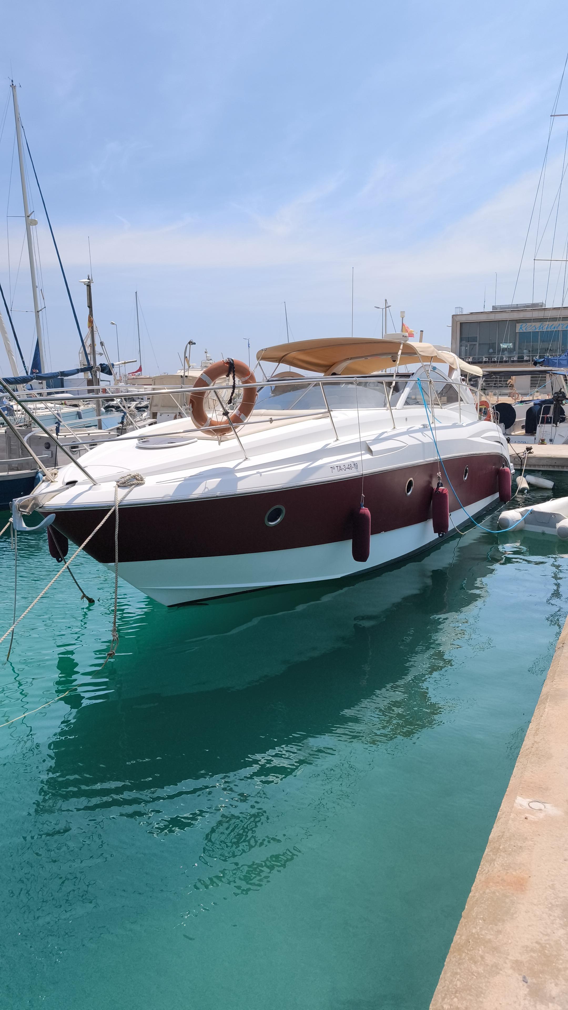 Beneteau Monte Carlo 37 2008 Beneteau Monte Carlo 37 yacht docked in a marina, clear blue water.