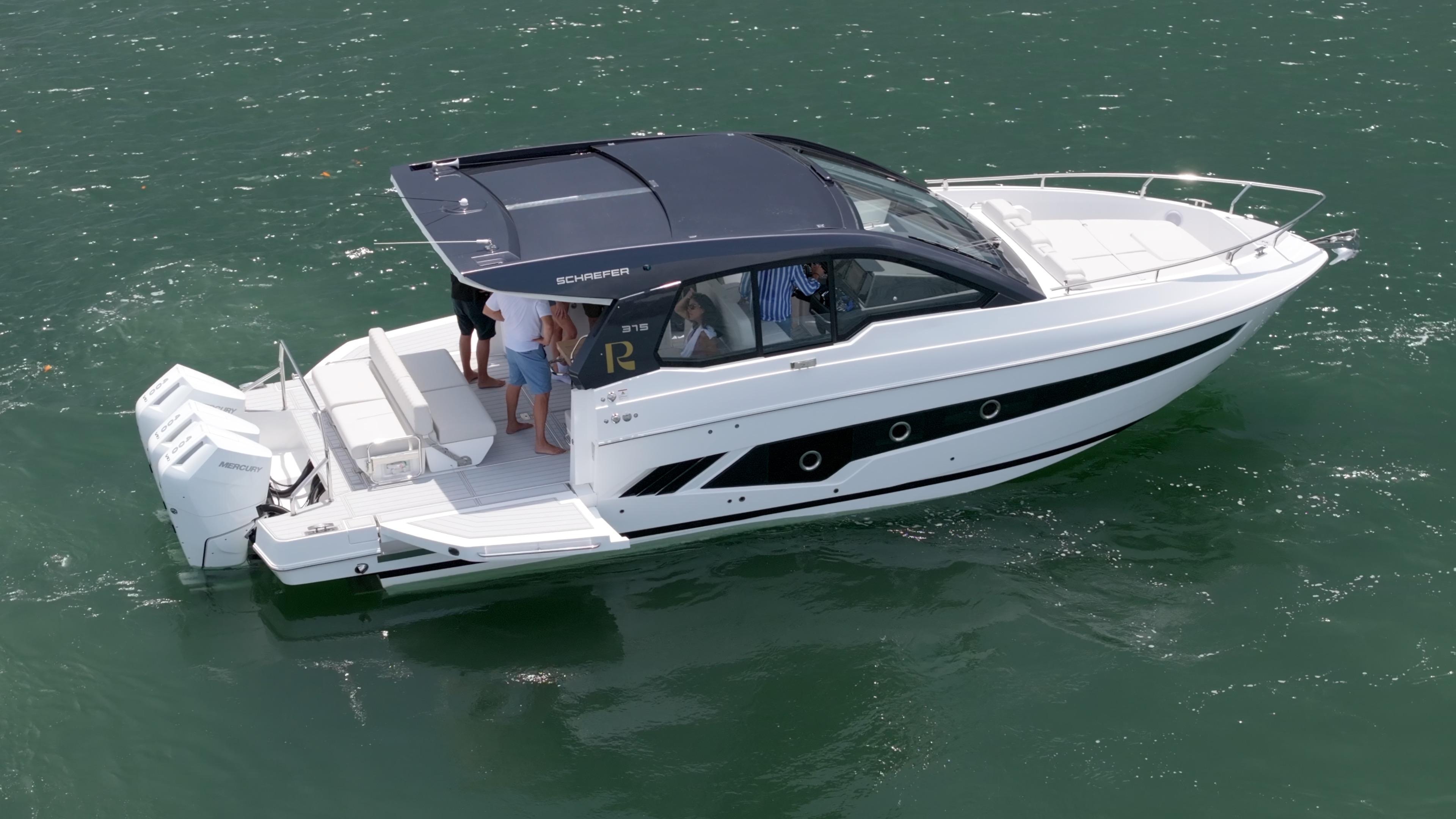 Schaefer 375 2025 Schaefer 375 yacht cruising on open water with passengers onboard.