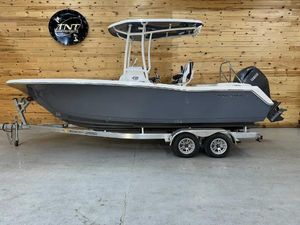 Tidewater 220 LXF 2024 Tidewater 220 LXF boat on trailer in showroom.
