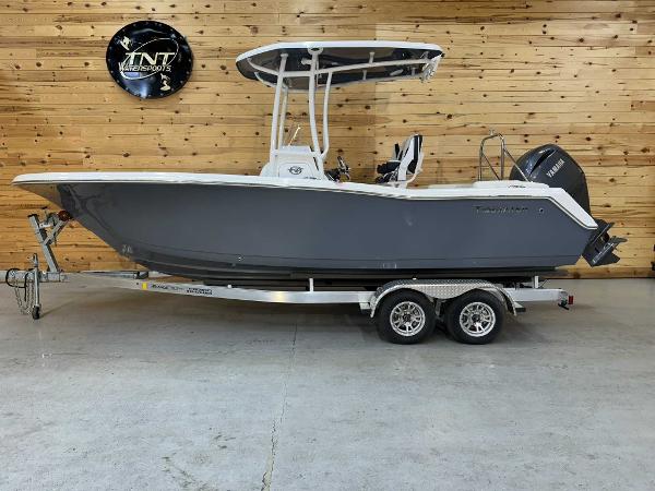 Tidewater 220 LXF 2024 Tidewater 220 LXF boat on trailer in showroom.