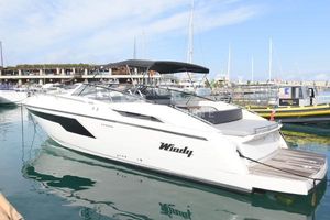 Windy 39 Camira 2018 Windy 39 Camira yacht docked in a marina, featuring sleek design and modern amenities.