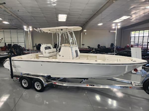 Pathfinder 2400 Open 2025 Pathfinder 2400 Open boat on trailer in showroom.