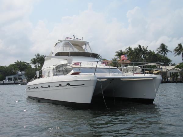 Africat Marine 420 2008 Africat Marine 420 yacht on water with palm trees in background.