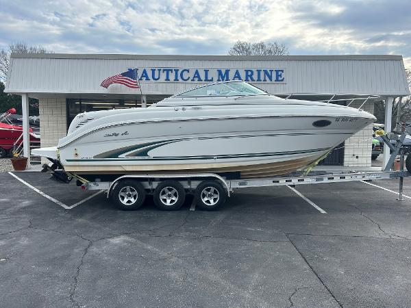 Sea Ray 245 Weekender 2001 Sea Ray 245 Weekender boat on trailer at Nautical Marine dealership.