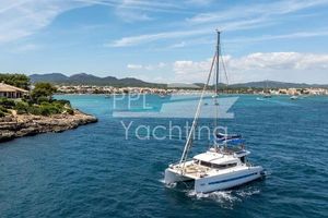 Bali 4.3 Sailing catamaran Bali 4.3, 2015 model, cruising in scenic coastal waters.
