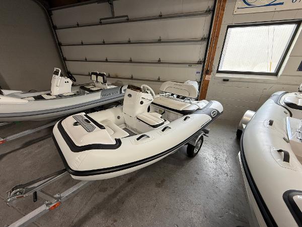 Walker Bay Generation 10 LTE 2025 Walker Bay Generation 10 LTE inflatable boat in a garage setting.
