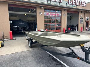Tracker Grizzly 1754 Jon 2025 Tracker Grizzly 1754 Jon boat on trailer outside service center.