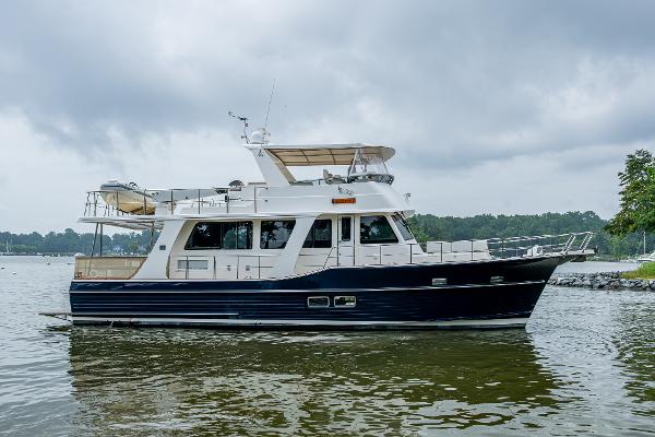 Grand Banks 54 Europa 2014 Grand Banks 54 Europa yacht on calm water under cloudy skies.