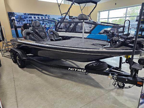 Nitro Z19 Pro 2024 Nitro Z19 Pro bass boat displayed in showroom, featuring sleek design and advanced features.