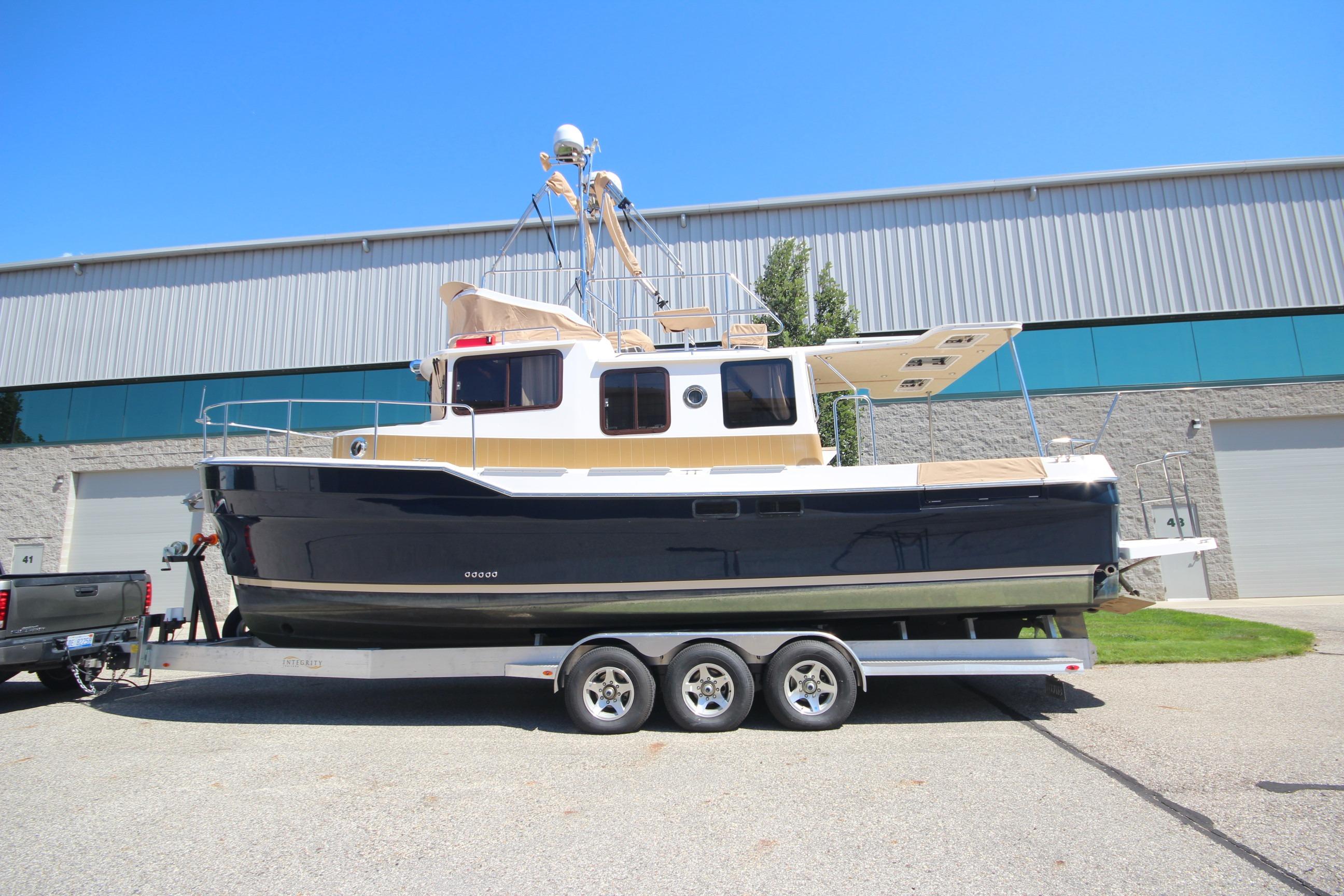 2020 Ranger Tugs R-31 Command Bridge LE & trailer
