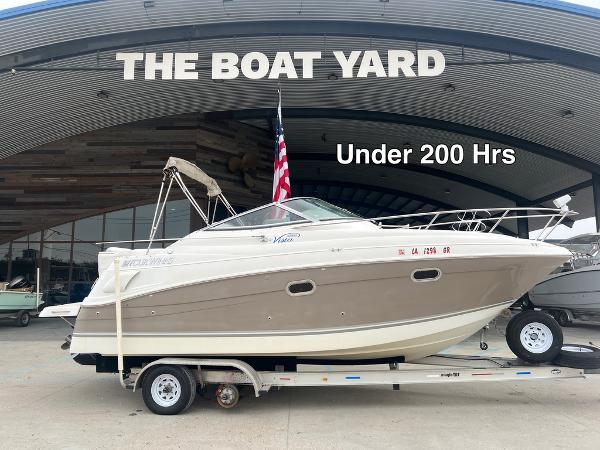 Four Winns 248 Vista 2004 Four Winns 248 Vista boat on trailer at The Boat Yard, under 200 hours.