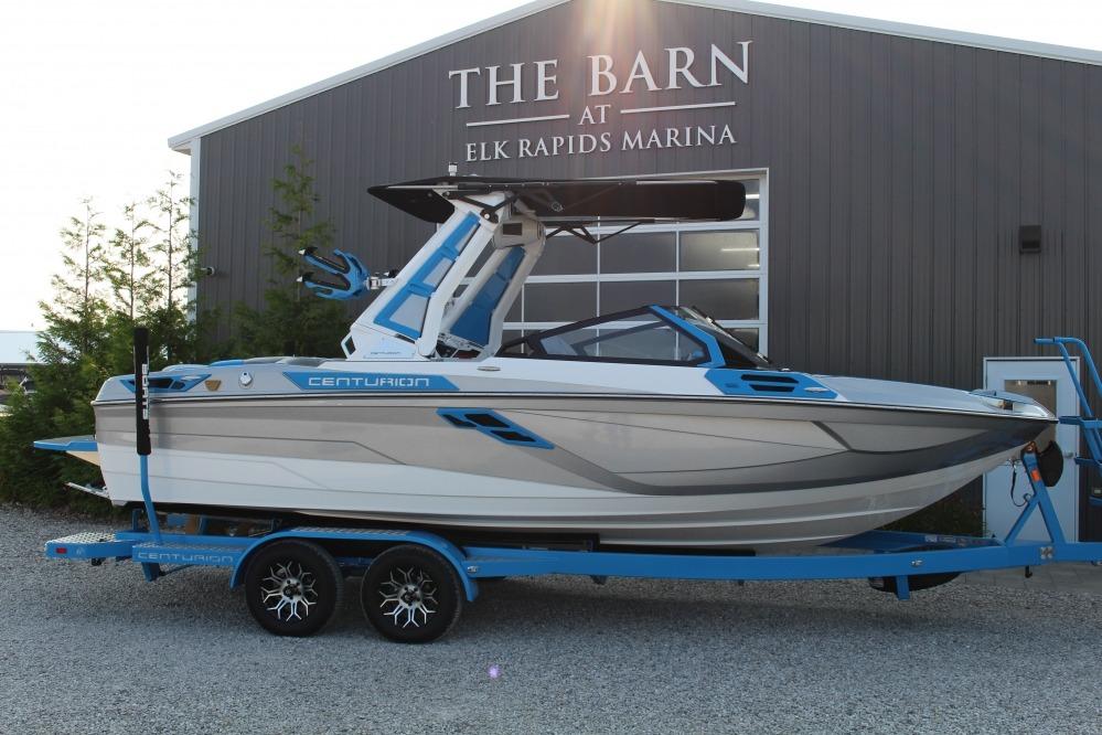 Centurion Ri230 2026 Centurion Ri 230 boat on trailer at Elk Rapids Marina.