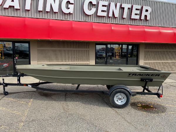 Tracker Grizzly 1754 Jon 2023 Tracker Grizzly 1754 Jon boat on trailer outside boating center.